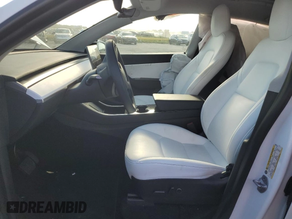 2021 Tesla Model Y Standard Range z VIN 5YJYGDED4MF107030, wystawiony jako Copart lot #66382913 z przebiegiem 39 024 mil mil oraz Szkoda całkowita • Salvage title. Historia ofert i sprzedaży dostępna na DreamBid. Obrazek 7.