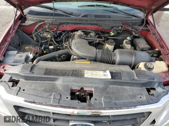 1999 Ford F-150 XL with VIN 1FTRX17LXXNA05552, listed as a Copart auction lot 60047025 with 193,122 mi miles and Salvage title. Bid and sale history available at DreamBid. Image 11.