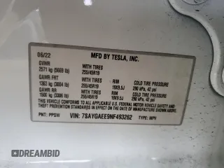 2022 Tesla Model Y Long Range z VIN 7SAYGAEE9NF493262, wystawiony jako Copart lot #52975005 z przebiegiem 63 189 mil mil oraz Szkoda całkowita • Salvage title. Historia ofert i sprzedaży dostępna na DreamBid. Obrazek 14.
