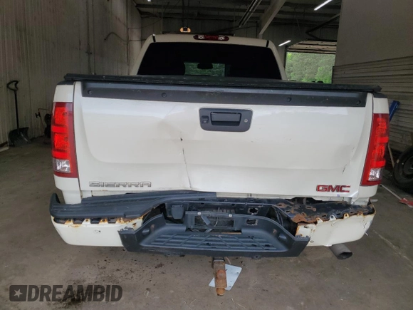 2013 GMC Sierra 1500 Denali z VIN 3GTP2XE22DG281165, wystawiony jako Copart lot #58723285 z przebiegiem 194 025 mil mil oraz Szkoda całkowita • Salvage title. Historia ofert i sprzedaży dostępna na DreamBid. Obrazek 6.