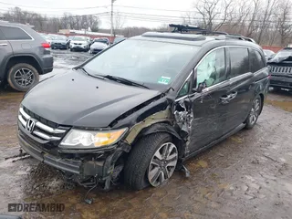 2016 Honda Odyssey Touring Elite with VIN 5FNRL5H90GB090566, listed as a IAAI auction lot 41564917 with 73,433 mi miles. Bid and sale history available at carsss.com. Image 21.