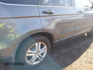 2010 Honda CR-V EX with VIN 5J6RE4H52AL039991, listed as a IAAI auction lot 41828104 with 131,013 mi miles. Bid and sale history available at carsss.com. Image 6.