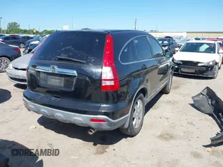 2007 Honda CR-V EX with VIN JHLRE38567C078868, listed as a IAAI auction lot 41962333 with 202,342 mi miles and . Bid and sale history available at carsss.com. Image 4.