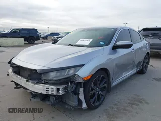 2019 Honda Civic Sport with VIN 19XFC2F8XKE015898, listed as a IAAI auction lot 41431062 with 108,071 mi miles and . Bid and sale history available at DreamBid. Image 2.