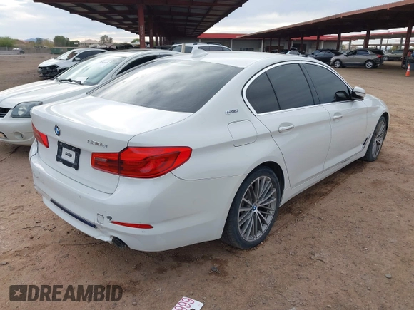 2018 BMW 5 Series 530e xDrive with VIN WBAJB1C55JB374652, listed as a IAAI auction lot 41812287 with 84,593 mi miles and . Bid and sale history available at carsss.com. Image 4.