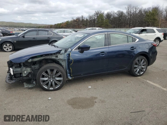 2018 Mazda 6 Grand Touring with VIN JM1GL1TY6J1323672, listed as a Copart auction lot 52700165 with 34,005 mi miles and Salvage Title. Bid and sale history available at DreamBid. Image 1.