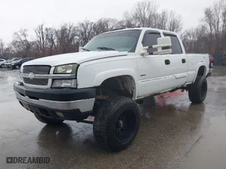 2003 Chevrolet Silverado 2500HD LS with VIN 1GCHK23103F198643, listed as a IAAI auction lot 41690312 with 297,395 mi miles. Bid and sale history available at carsss.com. Image 2.