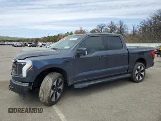 2022 Ford F-150 Lightning Pro z VIN 1FT6W1EV7NWG10601, wystawiony jako Copart lot #55057445 z przebiegiem Nie podano mil oraz Szkoda całkowita • Salvage title. Historia ofert i sprzedaży dostępna na DreamBid. Obrazek 1.