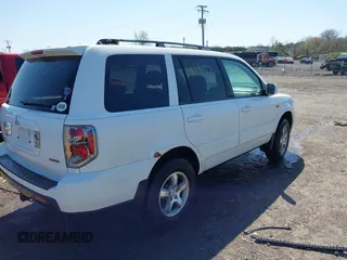 2007 Honda Pilot EX-L with VIN 2HKYF185X7H515012, listed as a IAAI auction lot 41914750 with 231,177 mi miles. Bid and sale history available at carsss.com. Image 4.