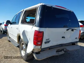 1999 Ford Expedition XLT z VIN 1FMPU18L2XLB77547, wystawiony jako IAAI lot #41161721 z przebiegiem 205 649 mil mil oraz . Historia ofert i sprzedaży dostępna na DreamBid. Obrazek 6.