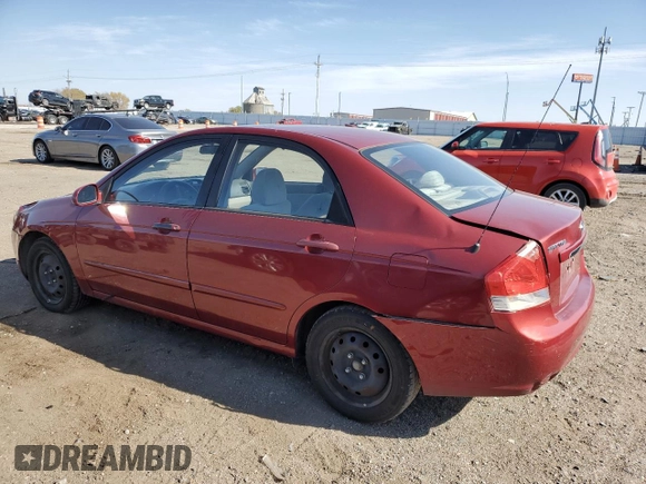 2009 Kia Spectra EX with VIN KNAFE221395656476, listed as a Copart auction lot 77700844 with 90,079 mi miles and Salvage Title. Bid and sale history available at carsss.com. Image 2.