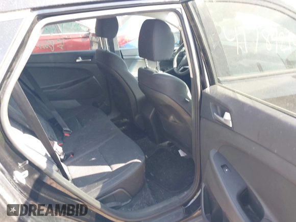 2019 Hyundai Tucson SE with VIN KM8J2CA4XKU852946, listed as a IAAI auction lot 41784214 with 120,857 mi miles. Bid and sale history available at carsss.com. Image 8.