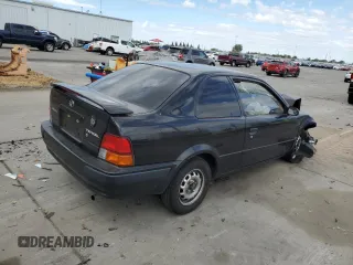 1996 Toyota Tercel DX z VIN JT2AC52LXT0157984, wystawiony jako Copart lot #76524974 z przebiegiem Nie podano mil oraz Szkody całkowita. Historia ofert i sprzedaży dostępna na DreamBid. Obrazek 3.