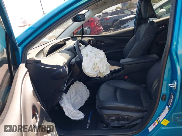 2021 Toyota Prius LE with VIN JTDKAMFP7M3169633, listed as a IAAI auction lot 41986170 with 55,925 mi miles and . Bid and sale history available at DreamBid. Image 5.