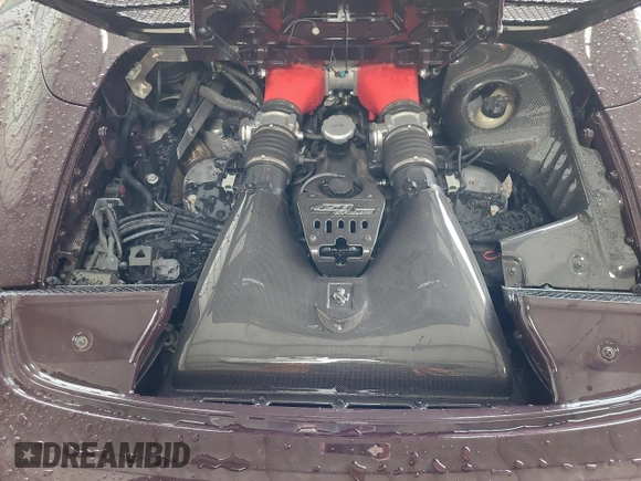 2014 Ferrari 458 Italia z VIN ZFF68NHA6E0201648, wystawiony jako Copart lot #41274584 z przebiegiem 15 586 mil mil oraz . Historia ofert i sprzedaży dostępna na DreamBid. Obrazek 12.