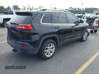 2014 Jeep Cherokee Latitude with VIN 1C4PJLCB0EW288309, listed as a IAAI auction lot 41624746 with 164,037 mi miles and . Bid and sale history available at DreamBid. Image 4.