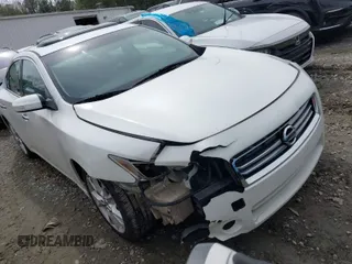 2013 Nissan Maxima SV with VIN 1N4AA5AP2DC817880, listed as a IAAI auction lot 41864805 with 153,828 mi miles and . Bid and sale history available at carsss.com. Image 1.