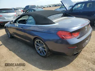 2012 BMW 6 Series 650i z VIN WBALZ3C57CDL71551, wystawiony jako Copart lot #54622705 z przebiegiem Nie podano mil oraz Szkody całkowita. Historia ofert i sprzedaży dostępna na DreamBid. Obrazek 2.
