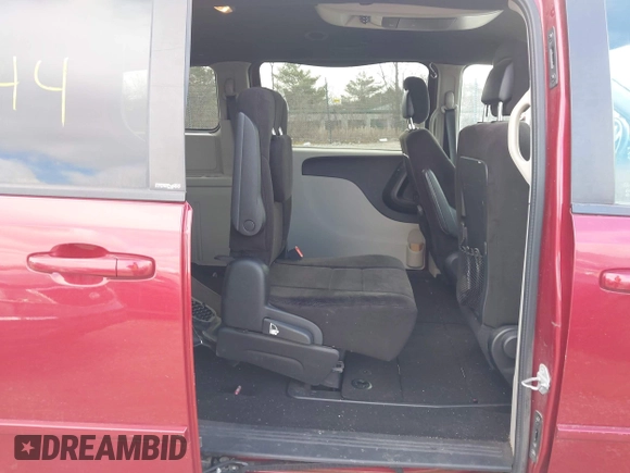 2014 Dodge Grand Caravan SE with VIN 2C4RDGBG6ER187868, listed as a IAAI auction lot 41949644 with 156,937 mi miles and . Bid and sale history available at DreamBid. Image 8.
