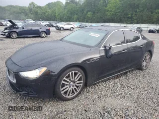 2014 Maserati Ghibli S Q4 with VIN ZAM57RTA1E1079718, listed as a Copart auction lot 56549185 with 99,380 mi miles and Salvage title. Bid and sale history available at DreamBid. Image 1.