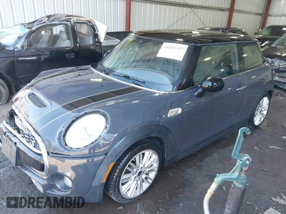 2014 MINI Hardtop S z VIN WMWXM7C50ET731680, wystawiony jako IAAI lot #41691317 z przebiegiem 47 205 mil mil oraz . Historia ofert i sprzedaży dostępna na DreamBid. Obrazek 17.