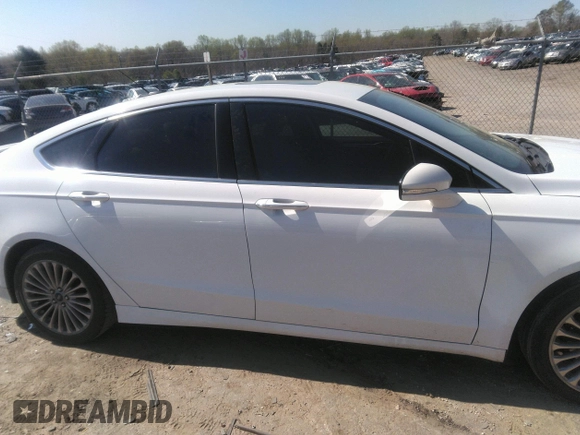 2016 Ford Fusion Titanium with VIN 3FA6P0K93GR331947, listed as a IAAI auction lot 41828409 with 181,555 mi miles and . Bid and sale history available at DreamBid. Image 13.