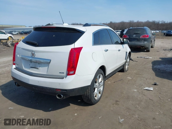 2015 Cadillac SRX Premium Collection with VIN 3GYFNDE38FS516009, listed as a IAAI auction lot 41785462 with 68,738 mi miles. Bid and sale history available at carsss.com. Image 4.