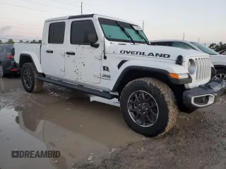 2023 Jeep Gladiator Overland with VIN 1C6JJTFM6PL547321, listed as a Copart auction lot 73760644 with Not provided miles and Salvage title. Bid and sale history available at DreamBid. Image 4.
