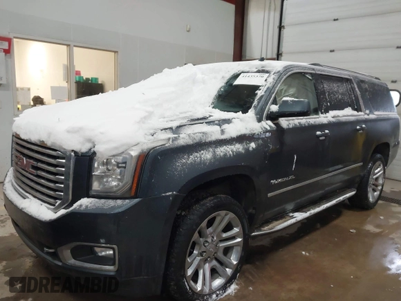 2019 GMC Yukon XL SLT with VIN 1GKS2GKC5KR137005, listed as a IAAI auction lot 41435370 with 125,453 mi miles and . Bid and sale history available at carsss.com. Image 2.