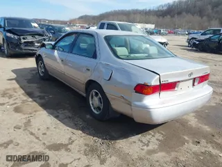 2000 Toyota Camry CE with VIN 4T1BG22K2YU657543, listed as a IAAI auction lot 41704419 with 255,076 mi miles. Bid and sale history available at carsss.com. Image 3.
