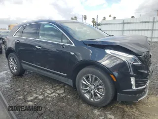 2023 Cadillac XT5 AWD Premium Luxury z VIN 1GYKNDRS6PZ144478, wystawiony jako Copart lot #45291295 z przebiegiem 45 910 mil mil oraz Nie do naprawy. Historia ofert i sprzedaży dostępna na DreamBid. Obrazek 4.