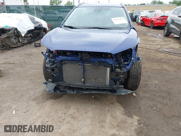 2022 Toyota Corolla Cross LE with VIN 7MUCAABG1NV042004, listed as a IAAI auction lot 42352160 with 58,442 mi miles and . Bid and sale history available at DreamBid. Image 6.