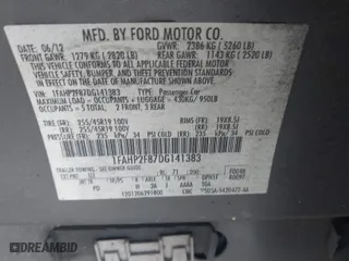 2013 Ford Taurus Limited with VIN 1FAHP2F87DG141383, listed as a IAAI auction lot 40200514 with 158,326 mi miles. Bid and sale history available at carsss.com. Image 9.