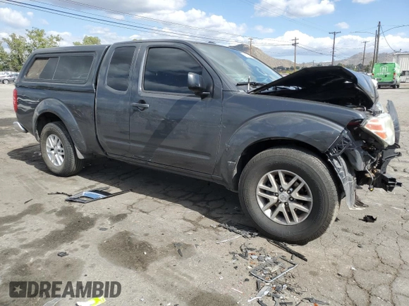 2015 Nissan Frontier SV with VIN 1N6BD0CTXFN708820, listed as a Copart auction lot 56605085 with 119,299 mi miles and Salvage title. Bid and sale history available at DreamBid. Image 4.