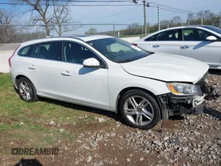 2015 Volvo V60 T5 Drive-E Premier z VIN YV140MEK2F1267396, wystawiony jako IAAI lot #41921329 z przebiegiem 93 937 mil mil oraz . Historia ofert i sprzedaży dostępna na DreamBid. Obrazek 14.