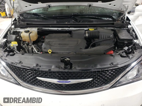 2020 Chrysler Pacifica Touring L with VIN 2C4RC1BGXLR128514, listed as a Copart auction lot 57333635 with 71,109 mi miles and Salvage title. Bid and sale history available at DreamBid. Image 12.