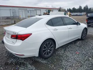 2015 Acura TLX V6 Tech with VIN 19UUB3F57FA009086, listed as a IAAI auction lot 41735411 with 212,203 mi miles. Bid and sale history available at carsss.com. Image 4.