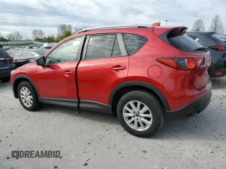 2014 Mazda CX-5 Touring with VIN JM3KE2CY6E0316041, listed as a Copart auction lot 52227835 with 69,921 mi miles and Salvage Title. Bid and sale history available at DreamBid. Image 2.