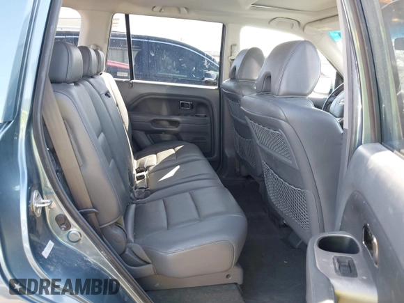 2007 Honda Pilot EX-L with VIN 5FNYF18517B028036, listed as a IAAI auction lot 41860675 with 61,217 mi miles and . Bid and sale history available at DreamBid. Image 8.