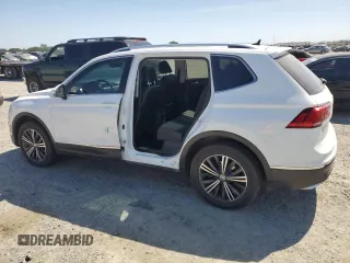 2019 Volkswagen Tiguan SE with VIN 3VV2B7AX5KM009947, listed as a Copart auction lot 54951455 with 90,569 mi miles and Salvage Title. Bid and sale history available at DreamBid. Image 2.