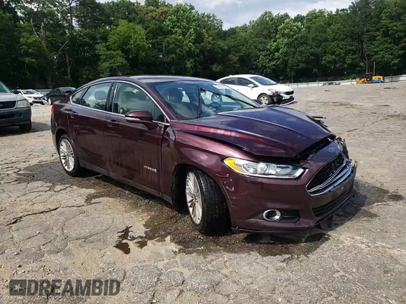 2013 Ford Fusion SE Hybrid z VIN 3FA6P0LU7DR197801, wystawiony jako Copart lot #60468095 z przebiegiem 169 215 mil mil oraz Szkoda całkowita • Salvage title. Historia ofert i sprzedaży dostępna na DreamBid. Obrazek 13.
