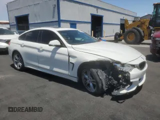 2015 BMW 4 Series 428i xDrive with VIN WBA4C9C50FG135058, listed as a Copart auction lot 60287555 with 86,809 mi miles and Salvage title. Bid and sale history available at DreamBid. Image 4.