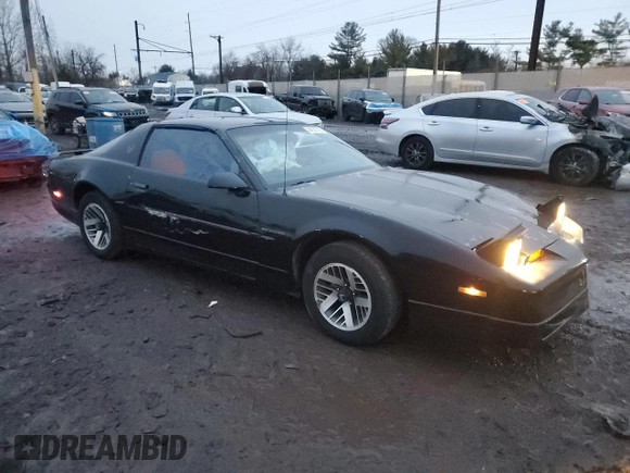1990 Pontiac Firebird with VIN 1G2FS23TXLL205077, listed as a Copart auction lot 44035705 with 142,809 mi miles and Salvage title. Bid and sale history available at DreamBid. Image 4.