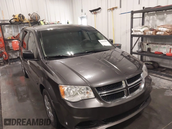 2015 Dodge Grand Caravan SE with VIN 2C4RDGBG2FR643477, listed as a IAAI auction lot 41955909 with 451,432 mi miles and . Bid and sale history available at DreamBid. Image 6.