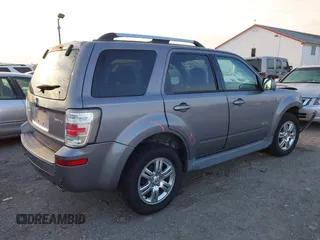 2008 Mercury Mariner Premier with VIN 4M2CU97128KJ38119, listed as a IAAI auction lot 41213121 with 76,699 mi miles and . Bid and sale history available at DreamBid. Image 4.