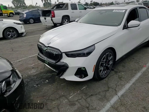 2024 BMW i5 eDrive40 z VIN WBY33FK04RCP62567, wystawiony jako Copart lot #85295344 z przebiegiem Nie podano mil oraz Szkody całkowita. Historia ofert i sprzedaży dostępna na DreamBid. Obrazek 11.