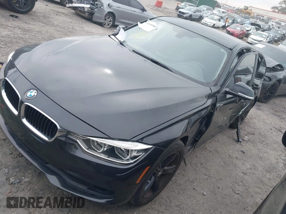 2018 BMW 3 Series 320i with VIN WBA8E1G51JNU91319, listed as a IAAI auction lot 41690084 with 67,609 mi miles. Bid and sale history available at carsss.com. Image 18.