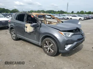 2018 Toyota RAV4 XLE with VIN JTMWFREV2JD125190, listed as a Copart auction lot 60484965 with Not provided miles and Salvage title. Bid and sale history available at DreamBid. Image 4.