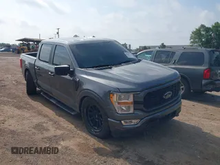 2021 Ford F-150 XL with VIN 1FTEW1EP8MKE56337, listed as a IAAI auction lot 42293733 with 57,171 mi miles and . Bid and sale history available at DreamBid. Image 1.