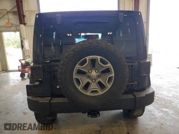 2013 Jeep Wrangler Unlimited Rubicon with VIN 1C4BJWFG0DL525304, listed as a Copart auction lot 59386085 with 130,043 mi miles and Clean title. Bid and sale history available at DreamBid. Image 6.